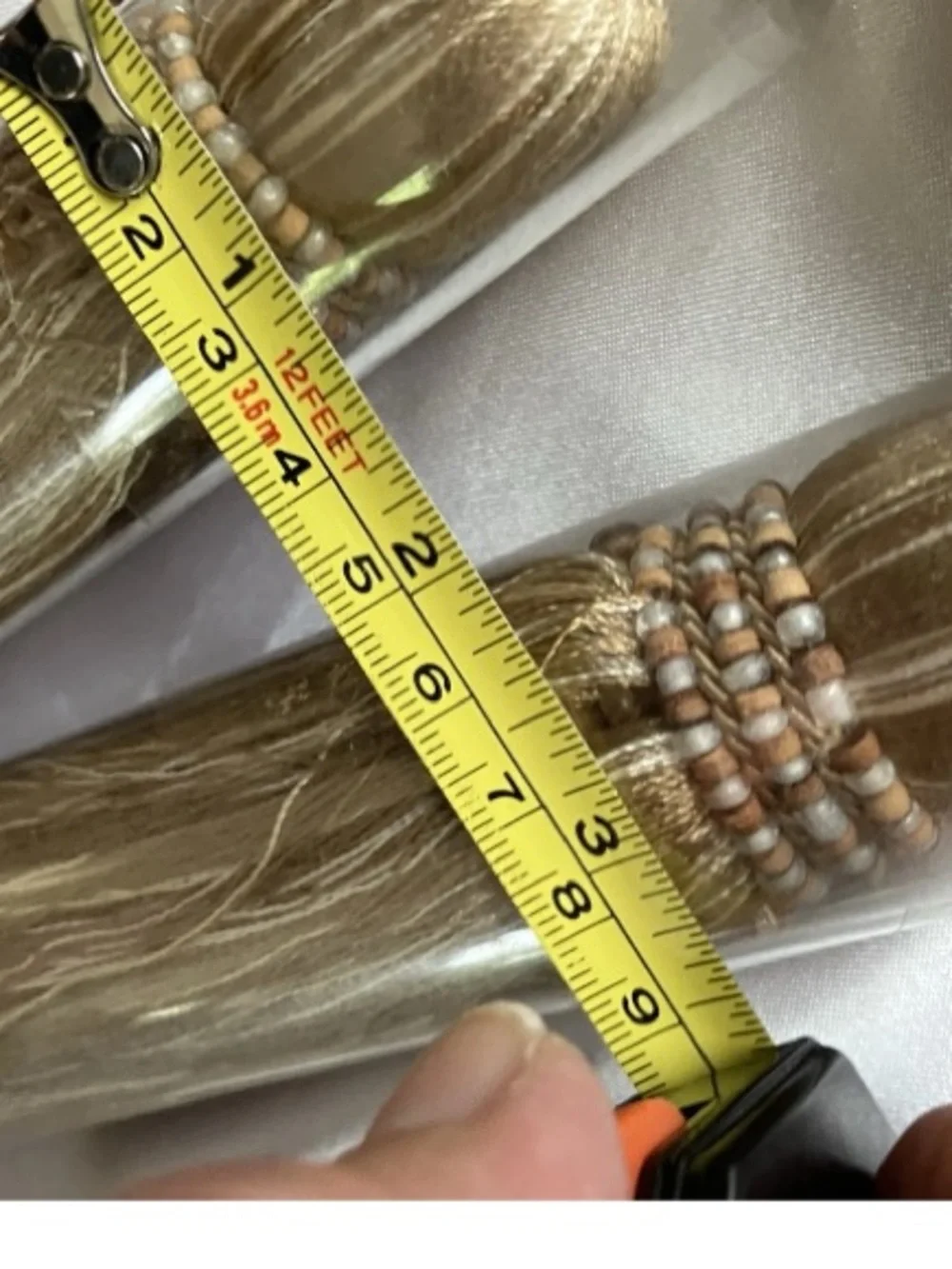 Drapery tie backs with pearl beading